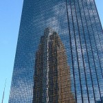 IDS Center reflects Wells Fargo Tower in downtown Minneapolis