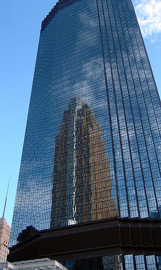 IDS Center reflects Wells Fargo Tower in downtown Minneapolis